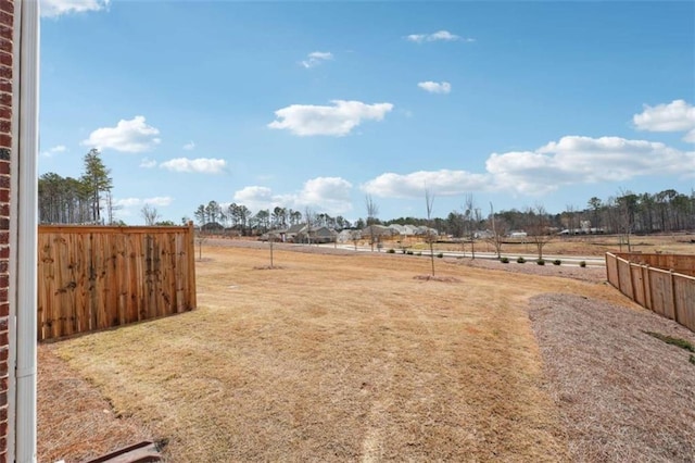 view of yard with fence