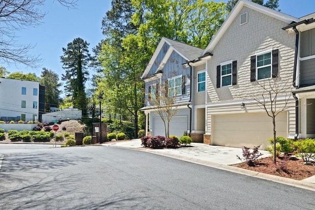 view of front of property with a garage