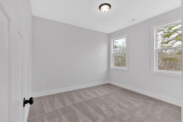 28 Creekview Dr SE, Cartersville, GA 30120 - carpeted empty room with healthy amount of natural light and baseboards