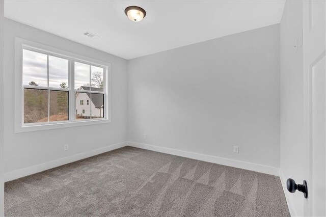 28 Creekview Dr SE, Cartersville, GA 30120 - carpeted spare room featuring baseboards