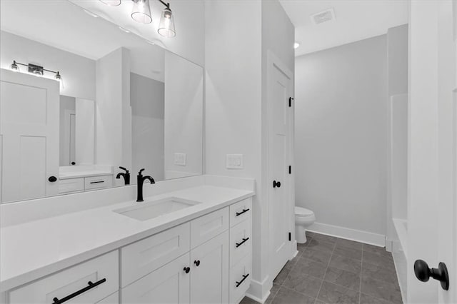 28 Creekview Dr SE, Cartersville, GA 30120 - full bathroom featuring vanity, toilet, and baseboards