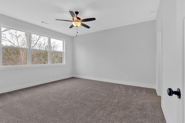 28 Creekview Dr SE, Cartersville, GA 30120 - unfurnished room featuring dark colored carpet, ceiling fan, and baseboards