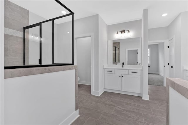 28 Creekview Dr SE, Cartersville, GA 30120 - full bathroom with vanity, a stall shower, baseboards, and toilet