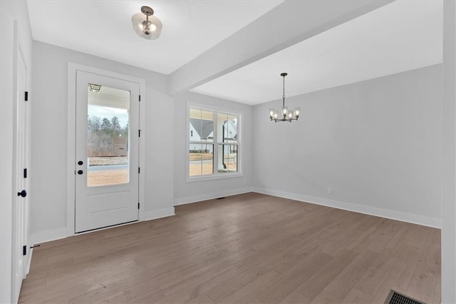 28 Creekview Dr SE, Cartersville, GA 30120 - entryway with a chandelier, wood finished floors, and baseboards