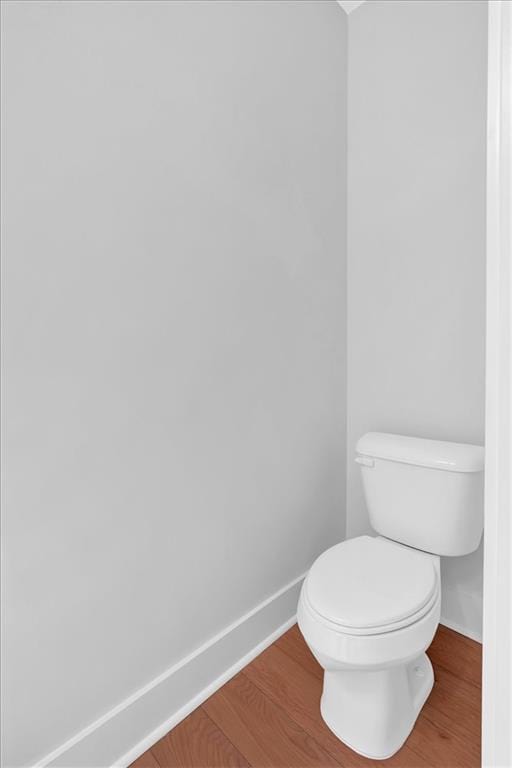 28 Creekview Dr SE, Cartersville, GA 30120 - bathroom with baseboards, wood finished floors, and toilet