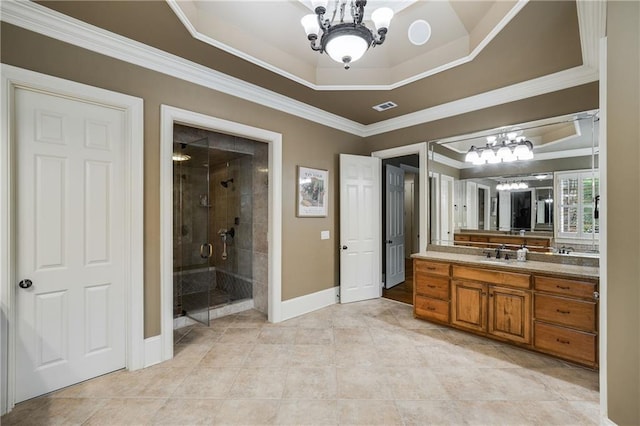 full bathroom featuring a chandelier, visible vents, ornamental molding, a stall shower, and a raised ceiling