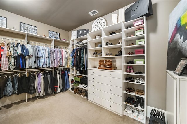 walk in closet featuring carpet floors and visible vents