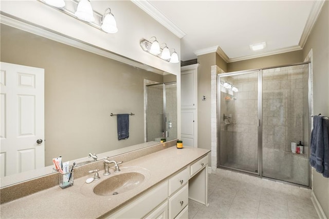 bathroom with a stall shower, tile patterned flooring, vanity, and crown molding