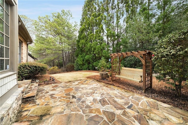 view of patio / terrace featuring a pergola