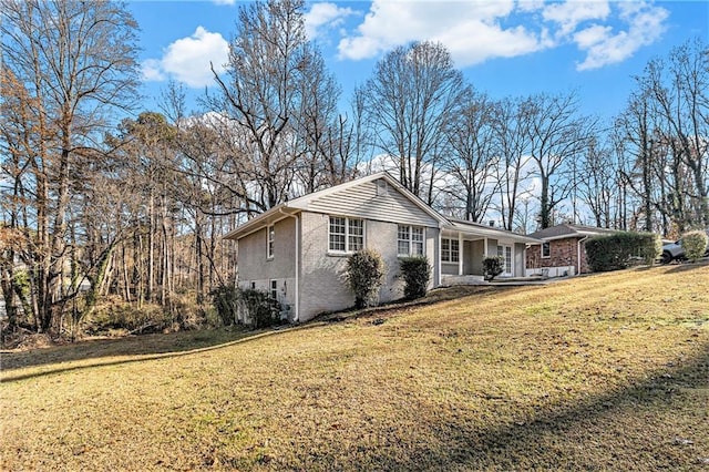 ranch-style house with a front yard