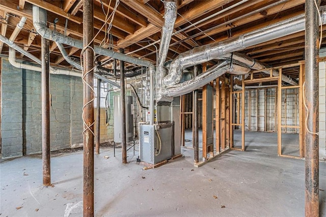 basement featuring water heater