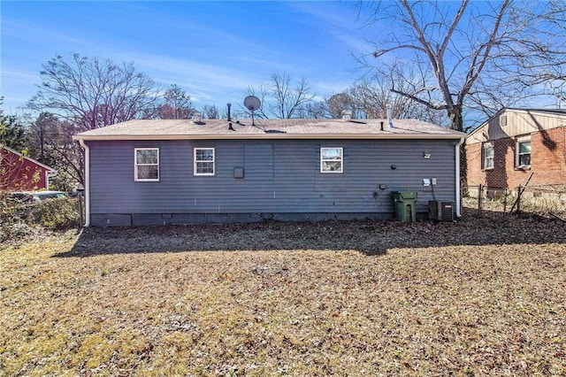 back of property with fence