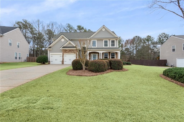 view of front facade featuring concrete driveway, a front lawn, and fence