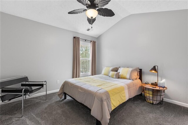 carpeted bedroom featuring lofted ceiling, visible vents, a ceiling fan, and baseboards