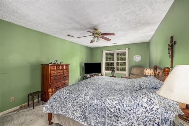 1519 Brookcliff Cir, Marietta, GA 30062 - bedroom with visible vents, baseboards, a textured ceiling, a ceiling fan, and carpet