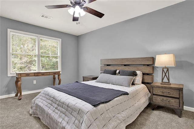 bedroom featuring ceiling fan and light colored carpet