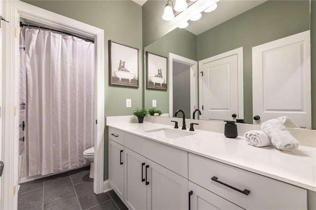 full bathroom with vanity, tile patterned floors, toilet, and shower / bath combo with shower curtain