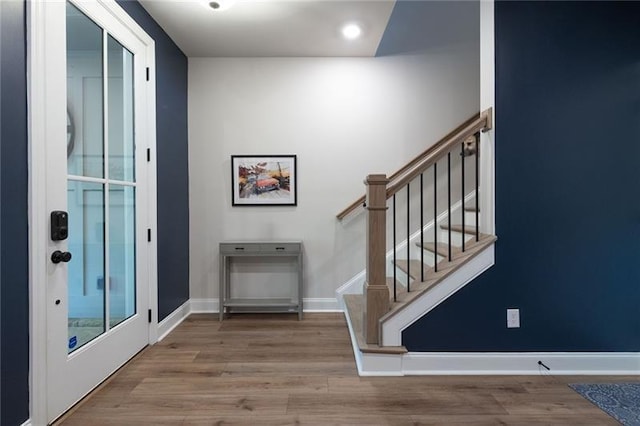 entrance foyer with hardwood / wood-style flooring