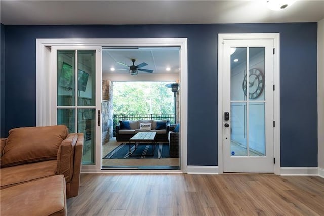 doorway with wood-type flooring