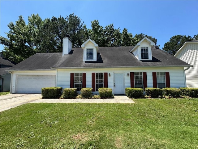 1050 Redan Trce, Stone Mountain, GA 30088 - cape cod-style house featuring an attached garage, a front yard, driveway, and a chimney