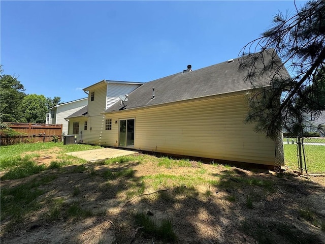 1050 Redan Trce, Stone Mountain, GA 30088 - rear view of property featuring cooling unit and a patio