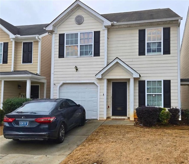 view of front of property featuring a garage