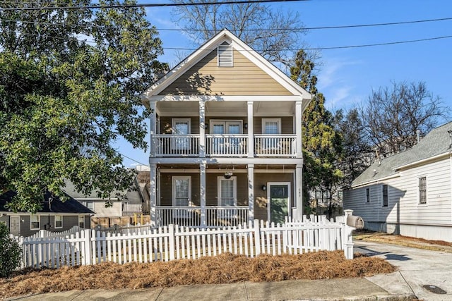 view of front of home featuring covered porch and a balcony