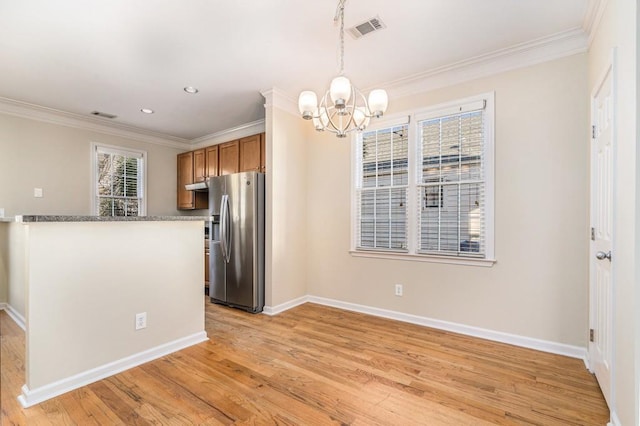 kitchen with stainless steel fridge with ice dispenser, light hardwood / wood-style flooring, a notable chandelier, decorative light fixtures, and ornamental molding