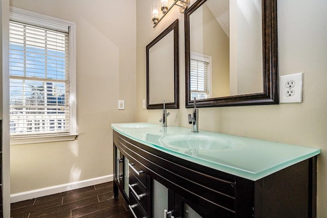 bathroom with plenty of natural light and vanity