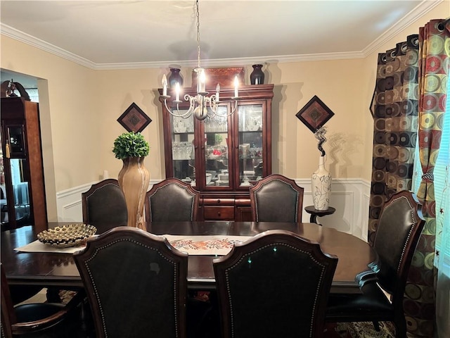 3140 Ridge Hill Pkwy, Douglasville, GA 30135 - dining area with a chandelier, crown molding, a wainscoted wall, and a decorative wall