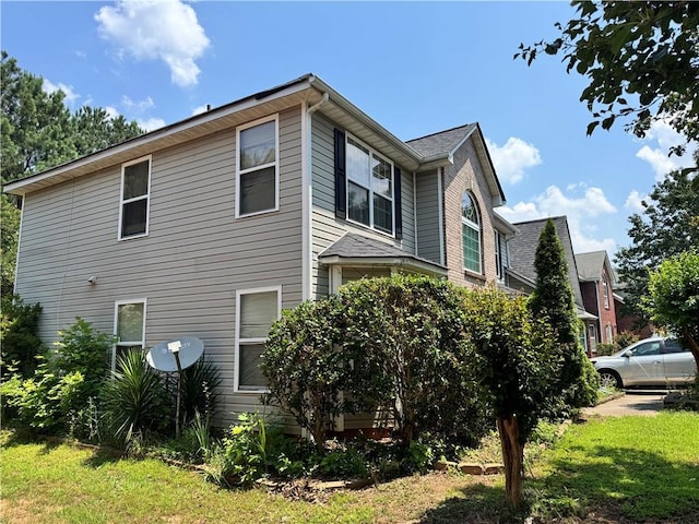 3140 Ridge Hill Pkwy, Douglasville, GA 30135 - view of side of property with a yard