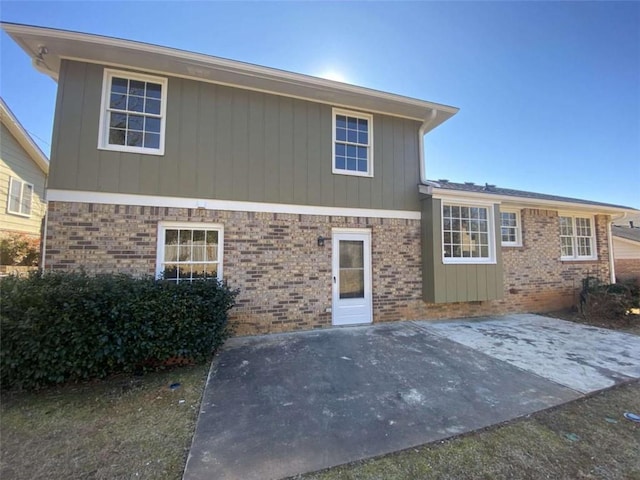 rear view of house featuring a patio area