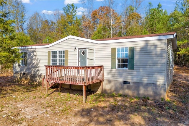 manufactured / mobile home featuring a deck