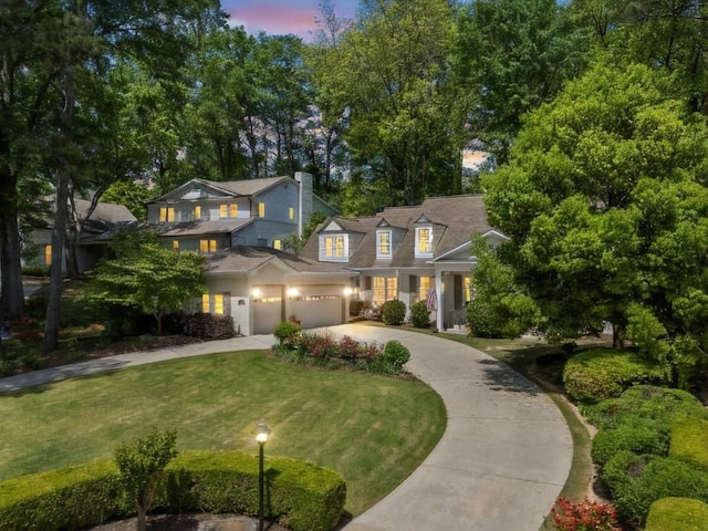 998 Ferncliff Rd NE, Atlanta, GA 30324 - view of front facade featuring concrete driveway and a front yard