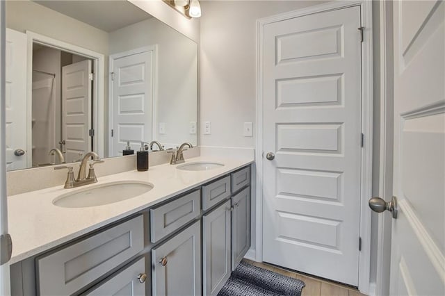 297 Delta Dr, Mcdonough, GA 30252 - bathroom with double vanity and tile patterned floors