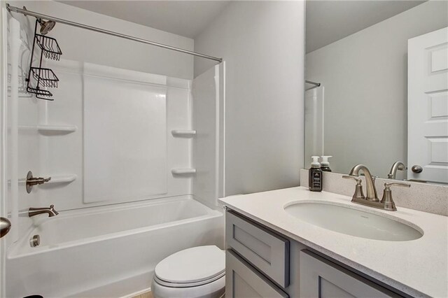 297 Delta Dr, Mcdonough, GA 30252 - bathroom with vanity, toilet, and washtub / shower combination