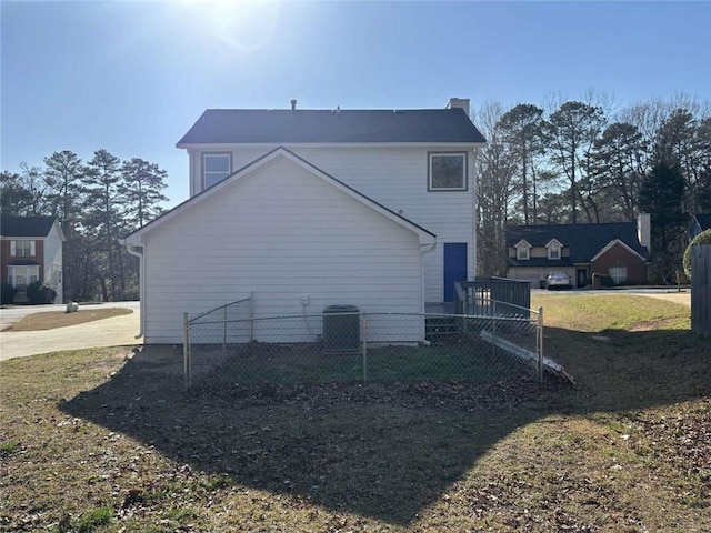 view of property exterior featuring fence