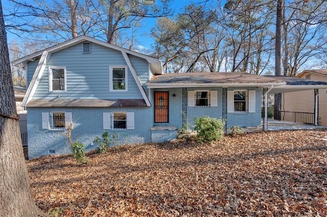 split level home featuring a porch and a carport