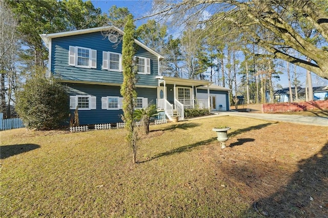 view of front facade with a porch and a front lawn