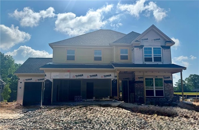 5390 Julep Ct, Cumming, GA 30028 - unfinished property with a shingled roof and brick siding