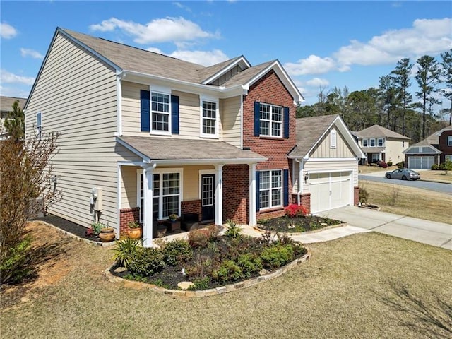 view of front of home with concrete driveway, board and batten siding, an attached garage, brick siding, and a front yard