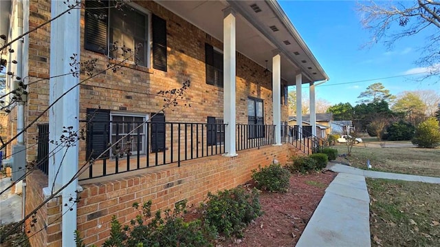 view of property exterior featuring a porch