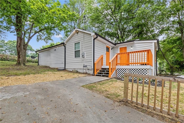 view of front of house with a deck