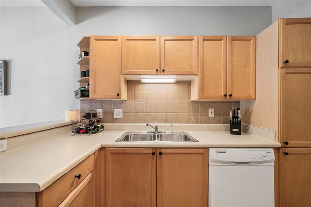 407 The Crossings Ln, Woodstock, GA 30189 - kitchen with a sink, light countertops, white dishwasher, and tasteful backsplash