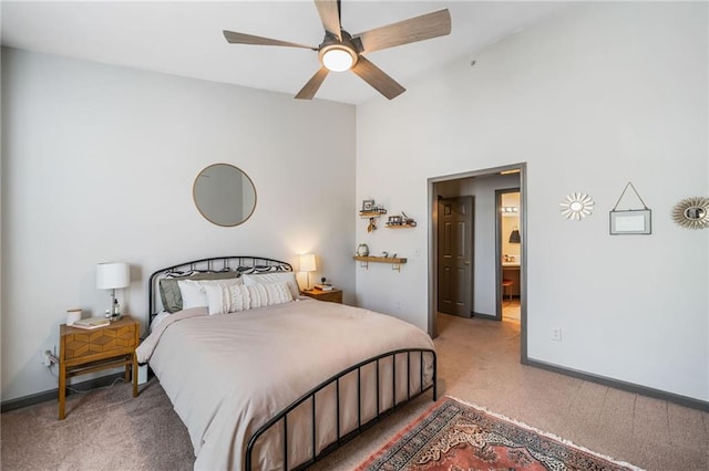 407 The Crossings Ln, Woodstock, GA 30189 - bedroom with a ceiling fan, carpet, and baseboards