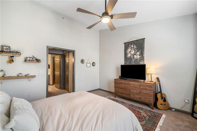 407 The Crossings Ln, Woodstock, GA 30189 - carpeted bedroom featuring baseboards and a ceiling fan