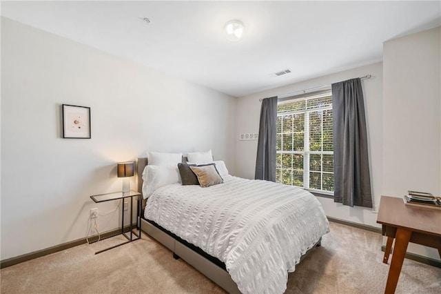 407 The Crossings Ln, Woodstock, GA 30189 - bedroom with baseboards, visible vents, and carpet floors