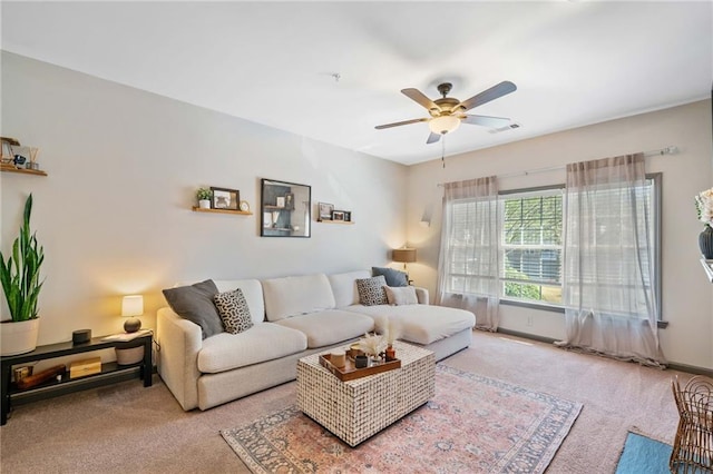 407 The Crossings Ln, Woodstock, GA 30189 - carpeted living room featuring a ceiling fan, baseboards, and visible vents