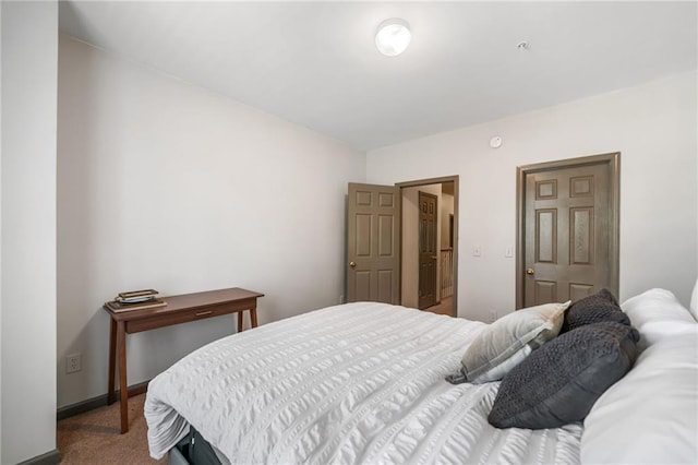 407 The Crossings Ln, Woodstock, GA 30189 - bedroom featuring baseboards and carpet floors