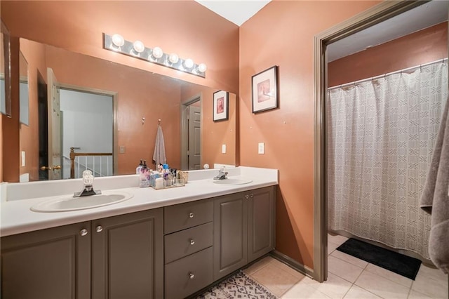 407 The Crossings Ln, Woodstock, GA 30189 - bathroom featuring tile patterned flooring, a sink, double vanity, and a shower with shower curtain